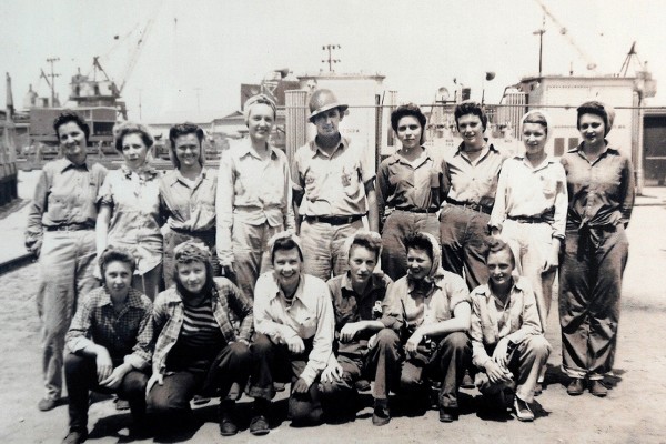 The July 6, 1945, copy of Fore and Aft, the Alabama Drydock and Shipbuilding Co. newspaper, features a picture of Zaddie Johnson (standing fourth from left), who was part of an all-female welding crew during World War II at the shipyard in Mobile.(AP photos by Marc Golden/The Gadsden Times)