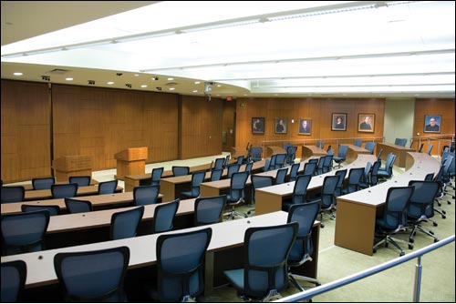 The appellate courtroom, located just off the forum on the ground floor of the law school, is decorated with portraits of Marquette Law School alumni or faculty who have served as members of the judiciary. With seating for 200 and a judicial bench behind the front wall, the room will host lectures, mock trials, debates and potentially, oral argument by the Wisconsin Supreme Court in the future.