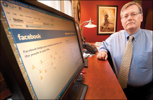 Attorney Richard Hart displays Facebook on his computer in his Milwaukee office. Hart has used Facebook posts as evidence in divorce cases. (WLJ photo by Kevin Harnack)