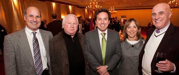 From left, Josh Gimbel, Judge Jeff  Wagner, Benjamin Wagner, Dyan Wagner and Frank Gimbel gather during the Milwaukee Young Lawyers Association’s annual Judges Night held Thursday, Dec. 9, at the Milwaukee Athletic Club.