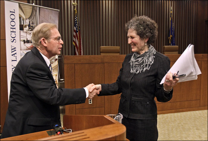 Justice David Prosser shakes hands with Assistant Attorney General JoAnne Kloppenburg after their debate for the Wisconsin Supreme Court at the Marquette University Law School in Milwaukee on Monday. (AP Photo/Milwaukee Journal-Sentinel, Benny Sieu)