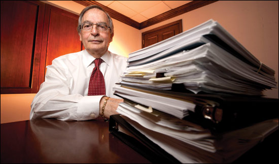 Attorney William Jennaro displays files pertaining to a mediation case he is working on at the Milwaukee offices of Cook & Franke SC. (WLJ photo by Kevin Harnack)
