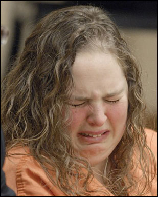 Breanna Gering cries as she is sentenced in Racine County Circuit Court on Thursday in Racine. Gering, 24, who gave birth in the bathroom of a restaurant in Racine, then discarded the newborn in an outdoor trash bin, was sentenced to nine years in prison and five years of extended supervision. Gering had pleaded guilty to first-degree reckless homicide for the infant's death. (AP Photo/Journal Times, Mark Hertzberg)