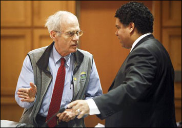 Wisconsin Secretary of State Doug LaFollette (left) and Dane County District Attorney Ismael Ozanne talk before a hearing at the Dane County Courthouse in Madison on March 29. (AP Photo/Michael P. King, Pool)