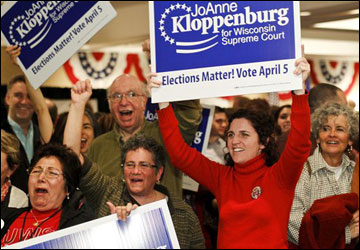 Supporters for Wisconsin Supreme Court candidate JoAnne Kloppenburg cheer while watching election results in Madison on Tuesday. (AP Photo/Andy Manis)