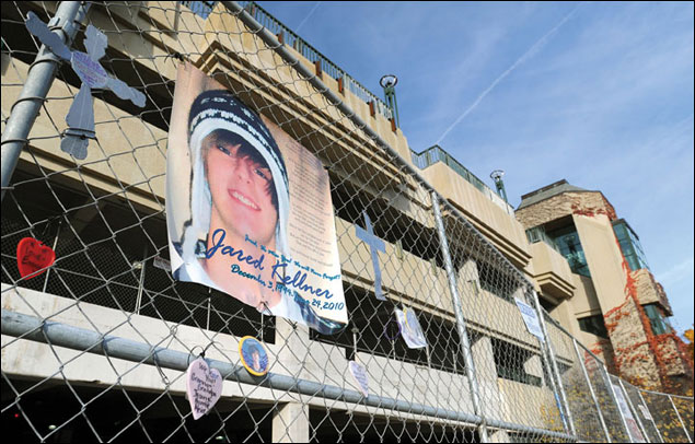 The O'Donnell Park parking garage in Milwaukee was closed for one year after a portion of a concrete facade fell, killing Jared Kellner. Kellner's family filed a wrongful death lawsuit on Jan. 19. A judge on Wednesday set the trial date for May 1, 2013. (File photo by Kevin Harnack)