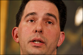 Wisconsin Gov. Scott Walker talks to the media at the state Capitol in Madison recently. (AP Photo/Andy Manis)