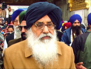 Parkash Singh Badal, chief minister of the Indian state of Punjab, pays obeisance at the Golden Temple in Amritsar, India. Badal is expected to visit Wisconsin for a July 5, 2013, wedding and a Sikh group accusing him of human-rights violations is offering $10,000 to anyone who serves him with a federal summons while he’s here. (AP Photo/Deepak Sharma, File)