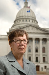 Former Wisconsin Supreme Court candidate Linda Clifford sits outside of the state Capitol. Clifford said campaign donations had a “decisive” effect on the 2007 election in which she lost to incumbent Justice Annette Ziegler. (Staff photo by Kevin Harnack)