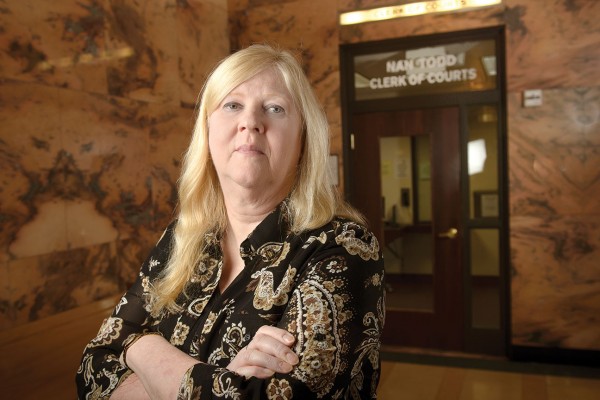 Nan Todd, Sheboygan County clerk of court, faces a growing dilemma of reduced revenue and an increasing caseload.