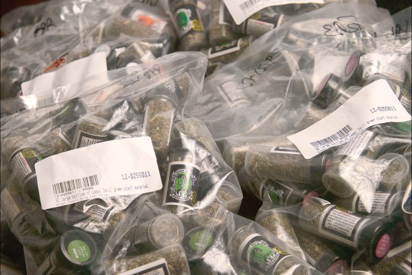 Tags mark evidence bags full of synthetic drugs seized from Imports Plus in Green Bay. 