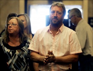 Jay and Marcie Steger, parents of Kira Steger, wait for an elevator along with other family members and friends before heading to the courtroom for the start of the murder trial of Jeffrey Trevino on Sept. 19 at the Ramsey County Courthouse in St. Paul, Minn. (AP Photo/The Star Tribune, David Joles)