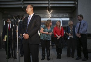 Ramsey County Attorney John Choi speaks about the verdict in Jeffrey Trevino's trial as Kira Steger's mother, Marcie, sister, Keri Anne, Ramsey County victim advocate Jennifer Mallinger, and Kira Steger's father, Jay, listen Wednesday, Oct. 2, 2013. Trevino was convicted in the slaying of Kira Steger, his wife, whose body was found in the Mississippi River months after she disappeared, though jurors decided he did not intend to kill her. (AP Photo/The Star Tribune, Jeff Wheeler)