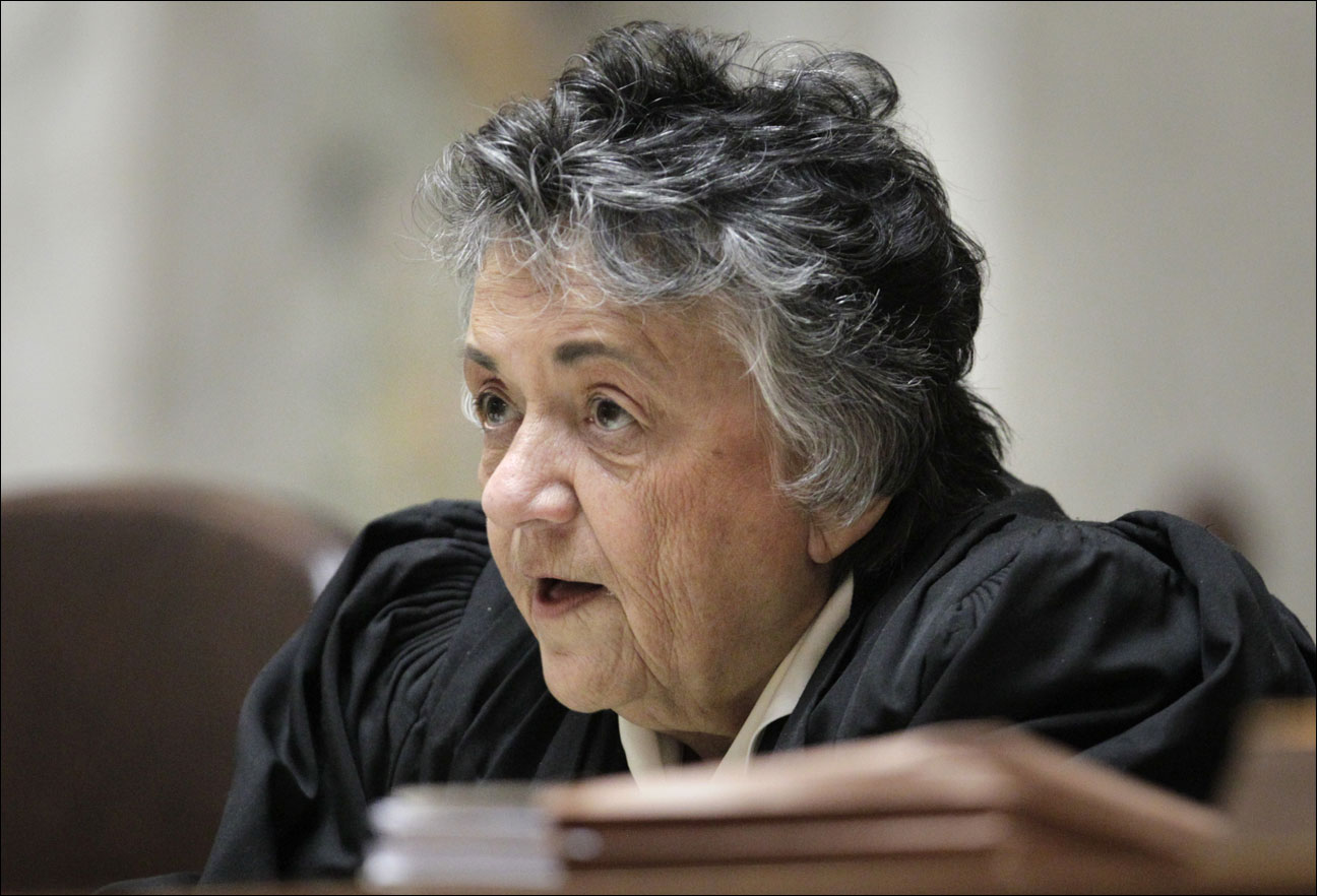 Wisconsin Supreme Court chief justice Shirley Abrahamson questions state attorney general J.B. Van Hollen, during arguments in Madison Teachers Inc. vs. Scott Walker, in the Wisconsin Supreme Court at the state Capitol in Madison, Wis., Monday, Nov. 11, 2013. Van Hollen stated that portions of Gov. Scott Walker's union restrictions are constitutional. (AP Photo/Wisconsin State Journal, M.P. King, Pool)