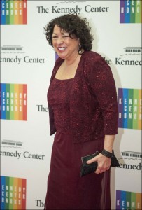 Justice Sonia Sotomayor arrives at the State Department for the Kennedy Center Honors gala dinner on Saturday, Dec. 7, 2013 in Washington. (AP Photo/Kevin Wolf)