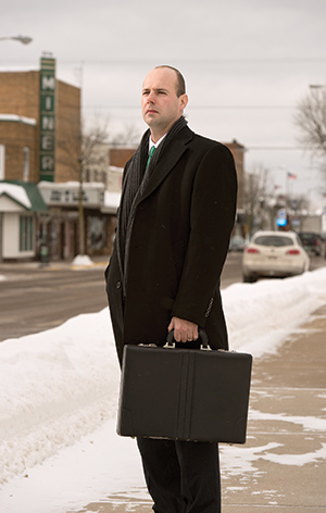 Karl Huber stands outside of his law office in Ladysmith, a small city in northwest Wisconsin. Huber is one of the few Wisconsin law school graduates who are trying small-town solo work just after graduation. (Staff photo by Kevin Harnack)