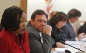 Wisconsin Rep. Tamara Grigsby, left, D-Milwuakee, questions members of the Wisconsin Legislative Fiscal Bureau Wednesday, Feb. 16, 2011, at the State Capitol in Madison, Wis., during a Joint Finance Committee meeting. Rep. Joel Kleefisch, R-Oconomowoc, right. Protestors to Wisconsin Gov. Scott Walker's proposal to eliminate collective bargaining rights for many state workers are on the second day demonstrating at the Capitol . (AP Photo/Andy Manis)