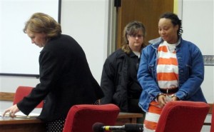 Kristen Smith, charged with kidnapping her half sister’s newborn from Wisconsin, arrives for a hearing Friday, Feb. 14, 2014 in Tipton, Iowa. At the hearing, Smith waived the right to challenge her extradition on a warrant from Texas charging her with tampering with government records. That means Texas authorities now have the ability to transport her to face that charge, but that isn’t expected to happen immediately as the judge ordered Smith to remain jailed in Tipton on $50,000 bond, citing the seriousness of the charges. (AP Photo/Ryan J. Foley)