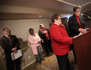 Judi Trampf, left, and her partner, Katy Heyning, both of Madison, Wis., speak during a press conference announcing the filing of a federal lawsuit challenging the legality of Wisconsin's ban on gay marriage at the Madison Concourse Hotel in Madison, Wis., Monday, Feb. 3, 2014. The American Civil Liberties Union is filing the suit on behalf of the couple, as well as three others, who are going to court for the right to marry. (AP Photo/John Hart, Wisconsin State Journal)