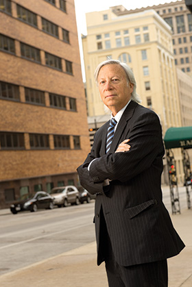 Charles Kahn, of A Neutral View LLC, a dispute resolution service, stands near his office in Milwaukee. The former Milwaukee County judge said courts are wary about limiting filings.