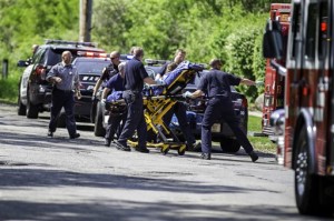 rescue workers take a stabbing victim to the ambulance in Waukesha, Wis. Prosecutors say two 12-year-old southeastern Wisconsin girls stabbed their 12-year-old friend nearly to death in the woods to please a mythological creature they learned about online. Both girls were charged as adults with first-degree attempted homicide Monday in Waukesha County Circuit Court. According to a criminal complaint, the girls had been planning to kill their friend for months and finally made the attempt in a park on Saturday morning, after a slumber party. (AP Photo/Abe Van Dyke)