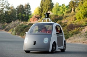 This image provided by Google shows a very early version of Google's prototype self-driving car. The two-seater won't be sold publicly, but Google on Tuesday, May 27, 2014 said it hopes by this time next year, 100 prototypes will be on public roads. (AP Photo/Google)