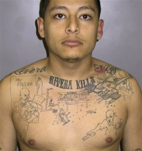 This undated file photo provided by the Los Angeles Sheriff’s department shows convicted murderer Anthony Garcia, sentenced to 65 years in prison in 2011 after a homicide investigator discovered he had the scene of an unsolved 2004 murder inked on his chest. (AP Photo/Los Angeles County Sheriff's Department, File)