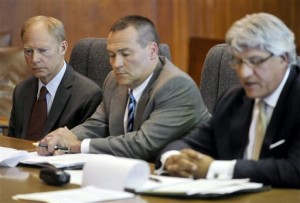 Samuel "Curt" Johnson III, left, listens as attorney Michael Hart, right, gives his sentencing argument Friday afternoon, June 6, 2014, in Racine, Wis. At middle is defense attorney Mark Richards. Johnson pleaded guilty Friday to having repeated sexual assault with a teenage girl, a charge that prosecutors ended up downgrading from a felony to a misdemeanor after they said the victim and her family repeatedly refused to cooperate with them. Johnson, whose family has run home-products giant SC Johnson for five generations, was convicted of fourth-degree sexual assault and disorderly conduct. He was sentenced to four months in jail, short of the one-year maximum. He was also fined $6,000. (AP Photo/Racine Journal Times, Gregory Shaver)