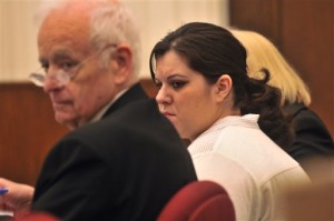 Jeanette M. Janusiak sits next to attorney Eric Schulenburg during her murder trial in Baraboo, Wis. Janusiak, convicted in June, has been sentenced to 40 years in prison after an infant died in her care. Janusiak, of Reedsburg, Wis., was convicted of killing 4-month-old Payten Rain Shearer, the daughter of her best friend. Janusiak accused detectives and prosecutors of twisting evidence to support the theory of her guilt and told Judge Patrick Taggart that someone else was responsible for the injuries the child suffered. (AP Photo/Baraboo News Republic, Tim Damos)