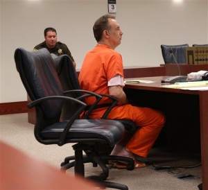 Steven Zelich appears in a Walworth County courtroom for his preliminary hearing Thursday, July 3, 2014, in Elkhorn, Wis. The former police officer has been charged with hiding a corpse in Walworth County after the bodies of two woman were found stuffed in suitcases deposited along a rural road in Wisconsin. A detective testified Thursday that Zelich said he killed the women during separate meetings at hotels to have rough sex. The judge Zelich held for trial on the hiding a corpse charges. (AP Photo/Jeffrey Phelps)