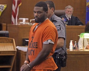 Delorean Bryson enters court before his sentencing, Wednesday, Aug. 27, 2014. Bryson has been sentenced to 42 years in prison for fatally shooting a cook at a restaurant last December. (AP Photo/Milwaukee Journal Sentinel, Mike De Sisti)
