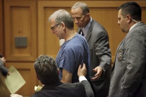 The Rev. Bruce Burnside is led away after being sentenced for second-degree reckless homicide at the Dane County Courthouse in Madison, Wis., in the 2013 death of Maureen Mengelt, Thursday, July 31, 2014. (AP Photo/Wisconsin State Journal, M.P. King)