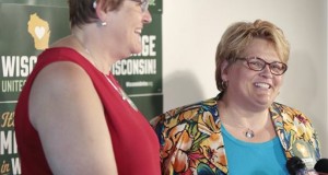Katy Heyning, left, and Judi Trampf, right, plaintiffs in Wolf v. Walker, speak during a press conference at Plan B in Madison, Wis., Thursday, Sept. 4, 2014. Earlier in the day, the 7th Circuit Court of Appeals in Chicago struck down the gay marriage bans of Wisconsin and Indiana as unconstitutional. (AP Photo/Wisconsin State Journal, M.P. King)