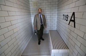 Dane County Sheriff David Mahoney shows an isolation cell in the jail in Madison, Wis. At the Dane County Jail, inmates with serious mental illnesses are routinely kept in similar cells for lack of an alternative.