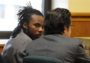 Darshawn Frison appears in court before his trial begins on Monday, Oct. 20, 2014, in Kenosha, Wis. Frison is on trial for the murder of Zachary Hernandez and Carlos Garcia. (AP Photo/Kenosha News, Sean Krajacic)