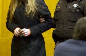 One of two 12-year-old girls accused of stabbing a classmate to please the fictional character Slender Man is led into a courtroom at the Waukesha County Courthouse in Waukesha, Wis. Tuesday, Nov. 18, 2014. Her attorney challenged a doctor's report that said she was competent to stand trial. A competency hearing was scheduled for Dec. 18, the same day as a competency hearing for the other girl accused in the case. (AP Photo/Waukesha Freeman, Charles Auer, Pool)