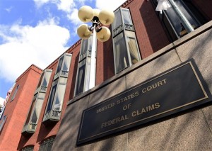 U.S. Court of Federal Claims in Washington. The building houses a special vaccine court, which Congress established to speed help to vaccine-injured Americans. Instead, the system has heaped additional suffering on thousands of families, The Associated Press has found. Cases are supposed to be resolved within 240 days, with options for another 150 days of extensions. (AP Photo/Susan Walsh)