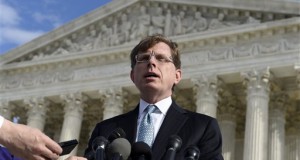 John P. Elwood, attorney for Anthony D. Elonis, who claimed he was just kidding when he posted a series of graphically violent rap lyrics on Facebook about killing his estranged wife, shooting up a kindergarten class and attacking an FBI agent, speaks to reporters outside the Supreme Court in Washington, Monday, Dec. 1, 2014. In a far-reaching case that probes the limits of free speech over the Internet, the Supreme Court considers whether violent and threatening rap lyrics posted on Facebook deserve protection under the First Amendment. (AP Photo/Susan Walsh)