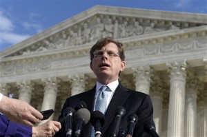 John P. Elwood, attorney for Anthony D. Elonis, who claimed he was just kidding when he posted a series of graphically violent rap lyrics on Facebook about killing his estranged wife, shooting up a kindergarten class and attacking an FBI agent, speaks to reporters outside the Supreme Court in Washington, Monday, Dec. 1, 2014. In a far-reaching case that probes the limits of free speech over the Internet, the Supreme Court considers whether violent and threatening rap lyrics posted on Facebook deserve protection under the First Amendment. (AP Photo/Susan Walsh)