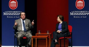 U.S. Supreme Court Justice Antonin Scalia, left, discusses his background as a law student with fellow Justice Elena Kagan Monday, Dec. 15, 2014 at the University of Mississippi in Oxford, Miss. Both justices spoke to an open audience of professionals, professors, students and area residents. (AP Photo/Rogelio V. Solis)