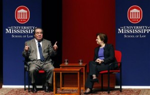 U.S. Supreme Court Justice Antonin Scalia, left, discusses his background as a law student with fellow Justice Elena Kagan Monday, Dec. 15, 2014 at the University of Mississippi in Oxford, Miss. Both justices spoke to an open audience of professionals, professors, students and area residents. (AP Photo/Rogelio V. Solis)