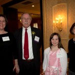 Maren Peterson (from left); honoree John Peterson, Peterson Berk & Cross SC; Lily Mae Brown and Marti Hemwall (Staff photo by Kevin Harnack)