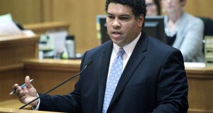 District Attorney Ismael Ozanne speaks in a Madison, Wis., court. Ozanne is weighing whether to file charges against Madison Officer Matt Kenny in Tony Robinson’s death. Kenny, who is white, shot Robinson, who was biracial, on March 6. (AP Photo/Wisconsin State Journal,M.P. King, File)
