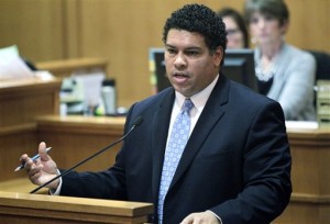 District Attorney Ismael Ozanne speaks in a Madison, Wis., court. Ozanne is weighing whether to file charges against Madison Officer Matt Kenny in Tony Robinson’s death. Kenny, who is white, shot Robinson, who was biracial, on March 6. (AP Photo/Wisconsin State Journal,M.P. King, File)