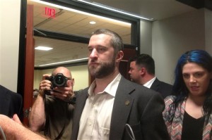 Dustin Diamond, center, exits the courtroom in Port Washington, Wis., Friday night, May 29, 2015, after a 12-person jury convicted him of two misdemeanors stemming from a barroom fight, but a Wisconsin jury cleared the former "Saved by the Bell" actor of the most serious felony charge. (AP Photo/Dana Ferguson)