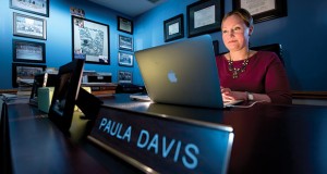 Paula Davis-Laack works at her desk at the Davis Laack Stress & Resilience Institute in Elm Grove. She founded the institute in 2010 to help attorneys and other professionals learn to manage stress, build resilience and prevent burnout. (Staff Photo by Kevin Harnack)
