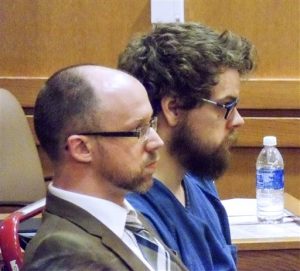 In this Friday, Sept. 30, 2016 photo, Christopher O'Kroley, right, appears in court, with his lawyer, Adam Welch, in Madison, Wis. O'Kroley will spend at least 40 years in prison for killing former grocery store co-worker Caroline Nosal in February, a Dane County judge decided at the hearing Friday. (Ed Treleven/Wisconsin State Journal via AP)