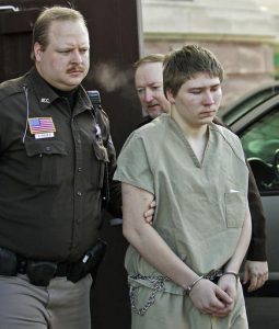 FILE - In this March 3, 2006, file photo, Brendan Dassey is escorted out of a Manitowoc County Circuit courtroom in Manitowoc, Wis. A federal appeals court is about to consider the fate of the Wisconsin inmate featured in the Netflix series "Making a Murderer." Dassey was sentenced to life in prison in 2007 in the death of photographer Teresa Halbach two years earlier. Dassey told detectives he helped his uncle, Steven Avery, rape and kill Halbach in the Avery family's Manitowoc County salvage yard. (AP Photo/Morry Gash, File)
