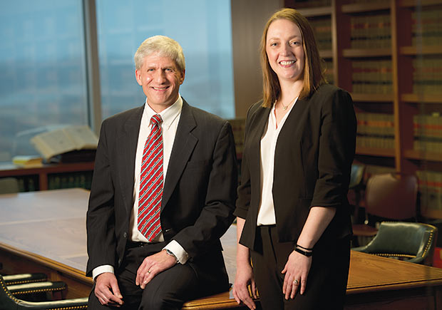 Thomas Rohe and Jennifer Barwinsky, both lawyers at Kasdorf, Lewis & Swietlik in Milwaukee, represent employers and businesses in workers’ compensation cases. Barwinski said she feels that doing away with LIRC would be akin to doing away with the state Court of Appeals. (Staff photo by Kevin Harnack)