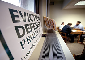 Volunteers work with a client on April 20 at the Eviction Defense Project, which is an eviction clinic run out of the Milwaukee County Courthouse. The recently launched clinic may not continue if members of Congress choose to approve a provision in President Donald Trump’s proposed federal budget that eliminates the Legal Services Corp.